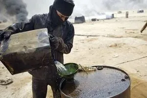 الحشد الشعبي يطيح باثنين من كبار مهربي المشتقات النفطية غرب الأنبار
