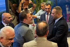 ورود واستقبال رسمي لمخرج كيكة الرئيس حسن هادي بمطار بغداد