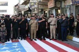وزير الداخلية العراقي يعاقب ضباطاً شاركوا في فعالية تضمنت دعس العلم الأمريكي شفق نيوز