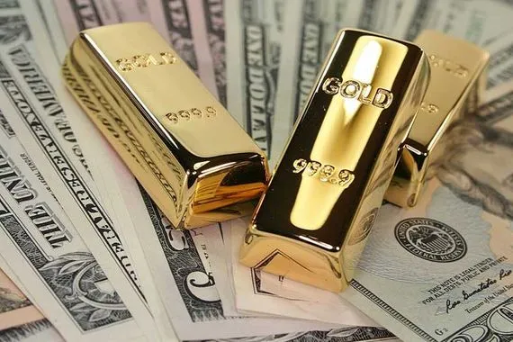 الذهب يتراجع متأثراً بتعافي الدولار