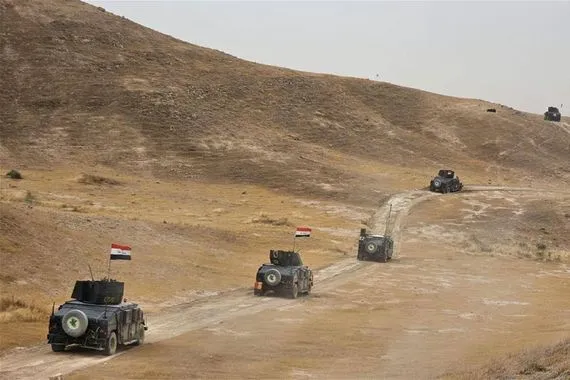 الاطاحة بـ11 ارهابيا في مناطق متفرقة من العراق