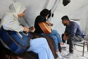 في غزة تعلّم الموسيقى لشفاء النفس في خضمّ الحرب