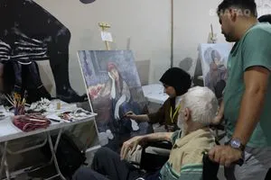 زقاق الفن يُحوِّل معرض بغداد الدولي للكتاب إلى ورشة إبداع حي صور شفق نيوز