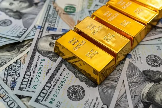 الذهب يتراجع مع صعود الدولار بالتزامن مع انحسار التوترات بين أميركا والصين