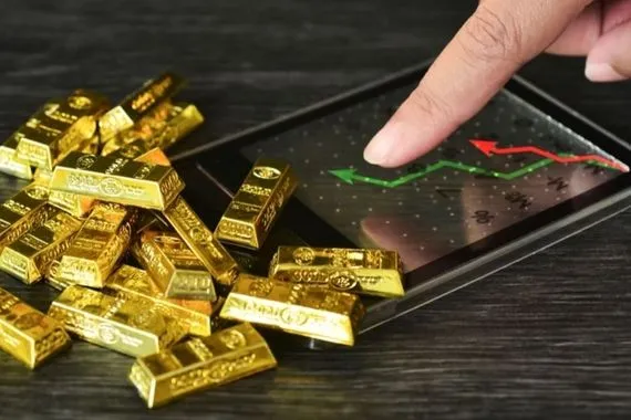 الذهب يتراجع بعد خفض فائدة الفيدرالي المنقسم