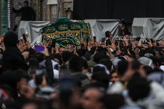 بالصور حشود الزائرين تقيم تشييعاً رمزياً لنعش الإمام الكاظم ع وكالة الانباء العراقية واع